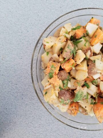 smoked potato salad in a glass bowl