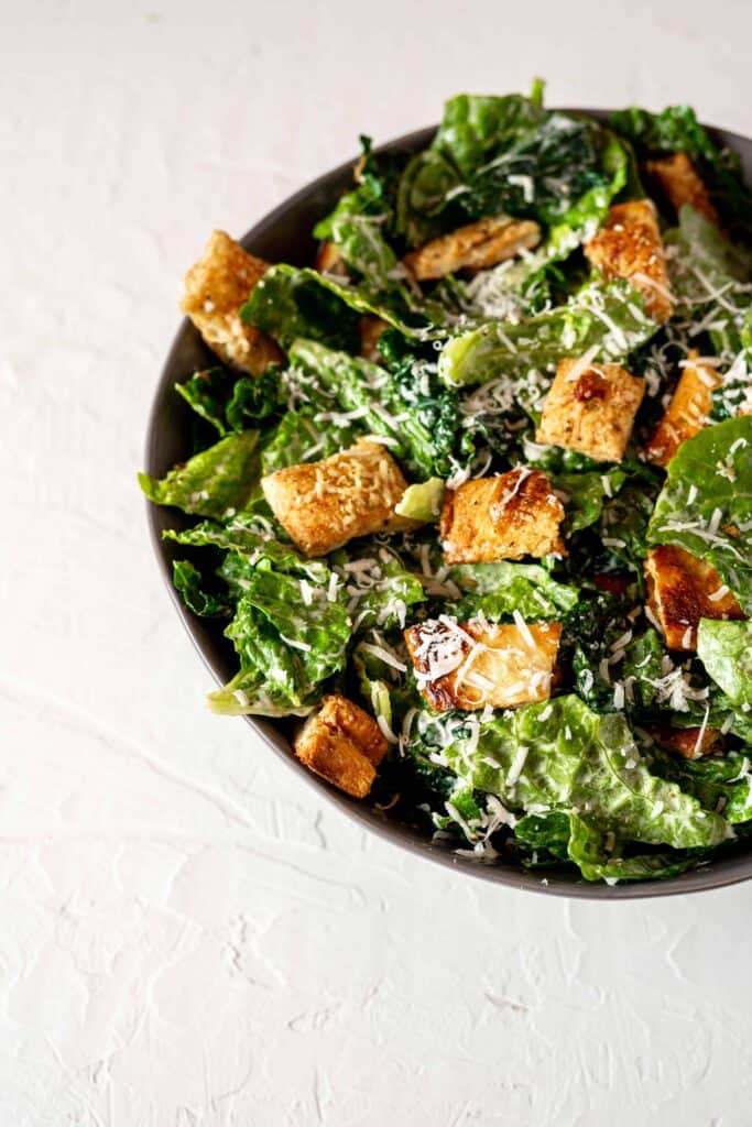 Kale Caesar Salad with Pizza Crust Croutons | Sip and Spice