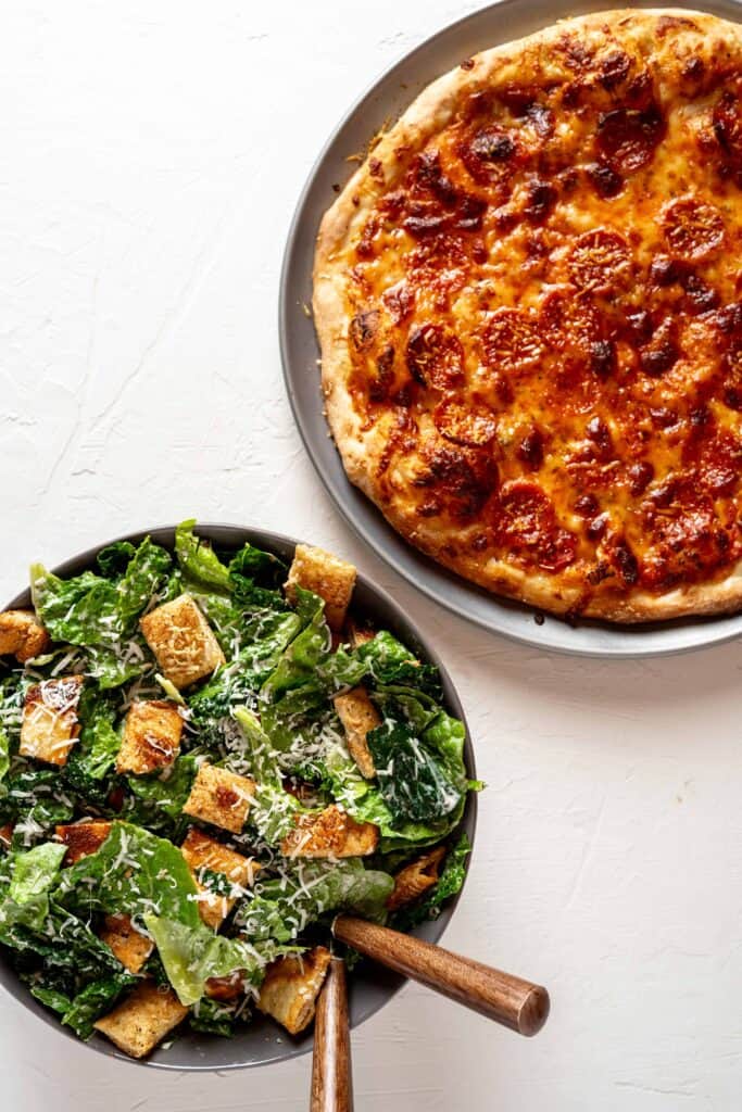 Kale Caesar Salad with Pizza Crust Croutons | Sip and Spice