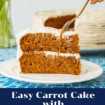 two layer carrot cake with a fork stuck in about to take a bite