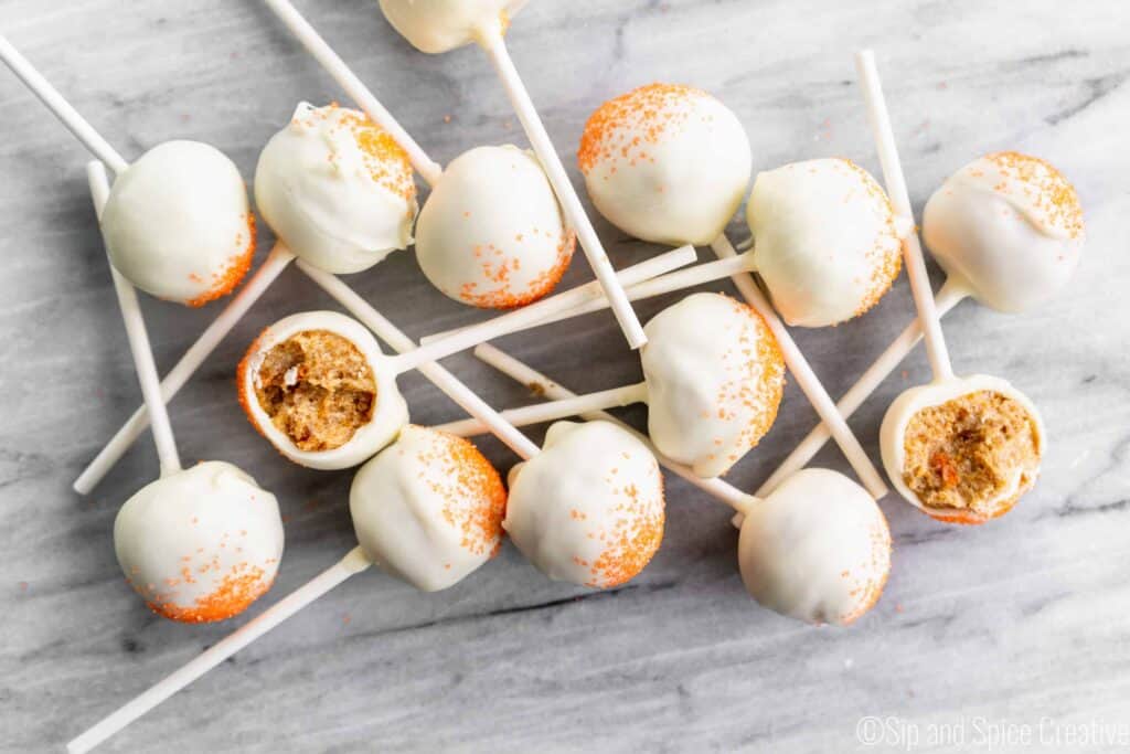 Carrot Cake pops on a marble surface