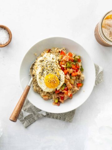 Savory Oatmeal with a Fried Egg and Bacon | Sip and Spice