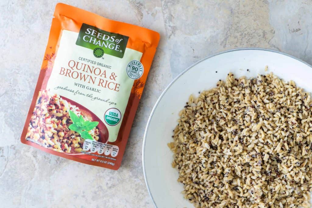 Seeds of Change Quinoa and Brown Rice Salad in a pan next to its packaging