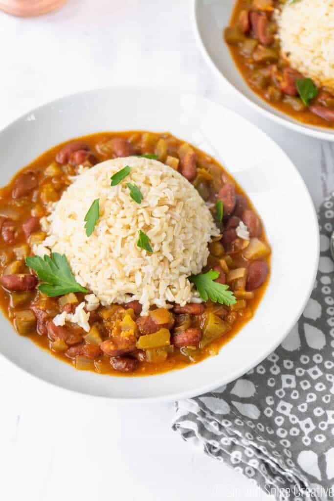 vegan red beans and rice in white bowls