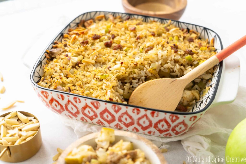 pan of Sausage and Rice Stuffing with Apples and Almonds with almonds