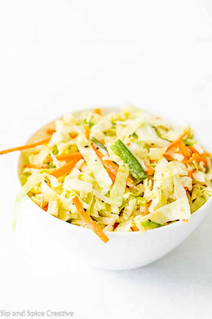 Classic coleslaw in a white bowl